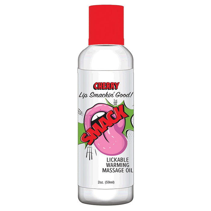Bottle of Cherry Lickable Warming Massage Oil with red cap on white background