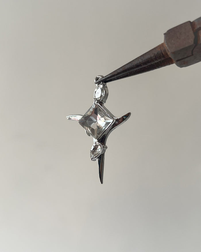 Stone cross charm