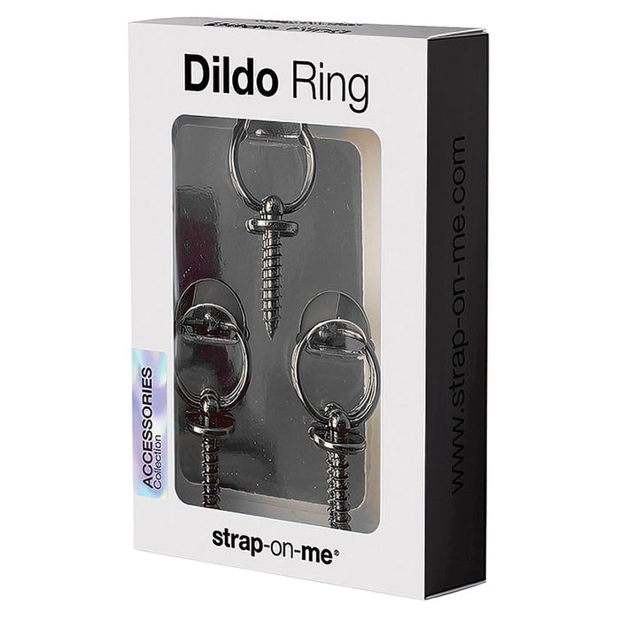 Packaged dildo Ring with 'strap-on-me' branding on a white background