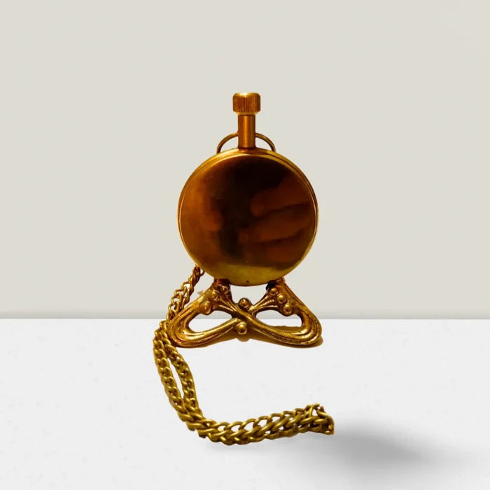 Antique brass pocket watch with chain