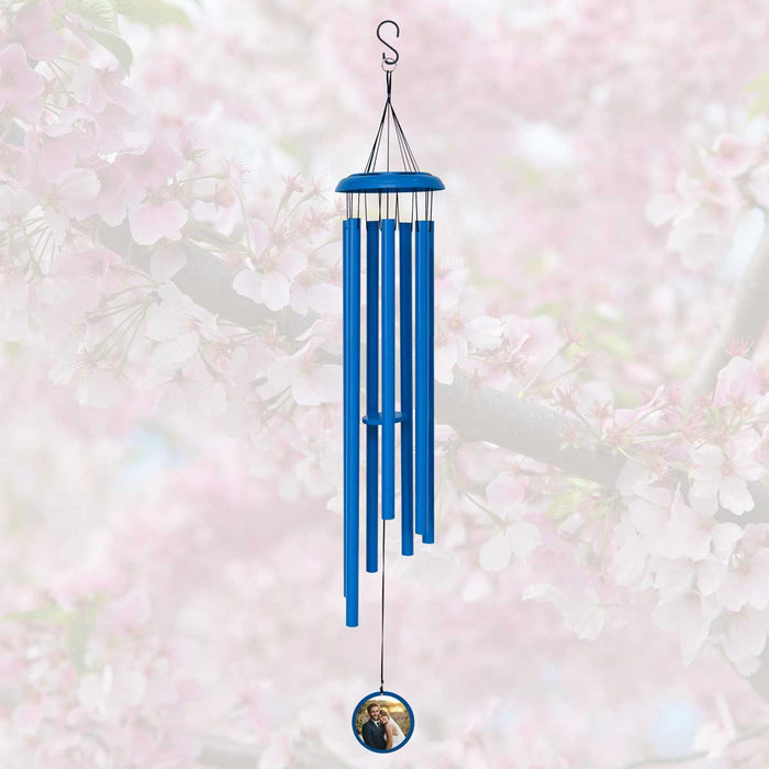 The wind chime in the image has a personalized photo pendant at the bottom.