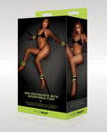 Product packaging for bed restraints with adjustable cuff by whipSMART, featuring a model in a black bikini.