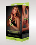 whipsmart product packaging with a model wearing the cuffs